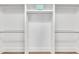 Walk-in closet with built-in shelving and ample hanging space at 12404 Beauvoir St, Raleigh, NC 27614