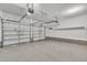 Large garage with multiple doors and high ceilings at 12404 Beauvoir St, Raleigh, NC 27614