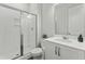 Well-maintained bathroom features a glass shower, modern vanity, and neutral decor at 125 Scotland Dr, Youngsville, NC 27596