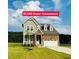 Charming two-story home with stone accents, landscaped yard, and a $5,000 buyer concession at 125 Scotland Dr, Youngsville, NC 27596