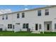 Backyard area features a grassy lawn and white vinyl fence at 168 Starlight St, Sanford, NC 27330