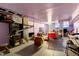 Partially finished basement providing additional space with exposed utilities and ample room for storage at 1704 Cypress Dr, Henderson, NC 27536