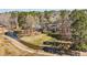 Aerial view showcasing a home with spacious backyard and nearby stream at 199 Black Cloud Dr, Louisburg, NC 27549