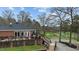 Golf course clubhouse with expansive deck overlooking the green at 199 Black Cloud Dr, Louisburg, NC 27549