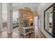 Inviting hallway with decorative stone wall, console table, and hardwood flooring at 199 Black Cloud Dr, Louisburg, NC 27549