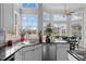 Close up view of kitchen with stainless steel dishwasher and a beautiful view at 199 Black Cloud Dr, Louisburg, NC 27549
