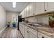 Kitchenette with light cabinets, neutral countertops, and a stainless steel refrigerator at 199 Black Cloud Dr, Louisburg, NC 27549
