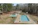 This community features a refreshing outdoor pool with a wading pool and picnic tables for relaxation and recreation at 199 Black Cloud Dr, Louisburg, NC 27549