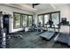 Modern fitness center featuring treadmills, elliptical, and weight machines, offering residents a convenient workout option at 201 Bluffwood Avenue, Chapel Hill, NC 27516