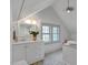 Bright bathroom features a modern vanity, sleek mirror, and stylish tiling at 2401 Englewood Ave, Durham, NC 27705