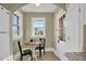 Cozy breakfast nook with natural light, perfect for enjoying morning coffee at 2401 Englewood Ave, Durham, NC 27705