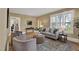 Comfortable living room with neutral tones, hardwood floors, and bright windows for an inviting space at 2401 Englewood Ave, Durham, NC 27705