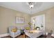 Bright office with hardwood floors, neutral decor and sitting area at 2401 Englewood Ave, Durham, NC 27705