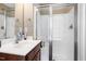 Bathroom featuring a vanity with a sink, a mirror, and a glass enclosed shower at 253 Bendemeer Ln, Rolesville, NC 27571