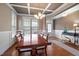 Elegant dining room featuring coffered ceilings, hardwood floors, and natural light at 253 Bendemeer Ln, Rolesville, NC 27571