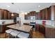 Spacious kitchen featuring a center island with seating, stainless appliances, and granite counters at 253 Bendemeer Ln, Rolesville, NC 27571