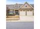 Charming two-story home featuring a two-car garage and manicured front yard, perfect for suburban living at 255 Thornwhistle Pl, Garner, NC 27529
