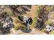 Aerial view of a charming home nestled amongst mature trees in a quiet neighborhood at 260 Crestdale Dr, Clayton, NC 27520