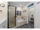 Clean bathroom includes double vanities, a soaking tub, and a walk-in shower with a rainfall shower head at 260 Crestdale Dr, Clayton, NC 27520