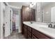 Bright bathroom featuring double sinks with modern fixtures and a shower with colorful curtains at 260 Crestdale Dr, Clayton, NC 27520