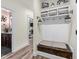 Hallway view with mudroom nook and glimpse into other rooms of the home at 260 Crestdale Dr, Clayton, NC 27520