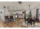 Eat-in kitchen featuring a breakfast bar, dining area, and natural light from the window at 260 Crestdale Dr, Clayton, NC 27520