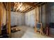 Unfinished basement with concrete walls, exposed ceiling, and ample storage space at 2635 Lakeview Dr, Raleigh, NC 27609