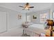 Cozy bedroom features neutral walls, a ceiling fan, and comfortable decor at 2635 Lakeview Dr, Raleigh, NC 27609