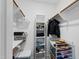 Walk-in closet featuring custom shelving and ample storage space for clothes and accessories at 2635 Lakeview Dr, Raleigh, NC 27609