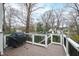 Back deck offering a backyard view and equipped with a grill for outdoor entertaining at 2635 Lakeview Dr, Raleigh, NC 27609