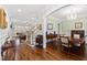 Open foyer and formal dining room featuring hardwood floors and elegant chandelier at 2635 Lakeview Dr, Raleigh, NC 27609