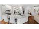 Spacious gourmet kitchen features double islands, stainless steel appliances, and custom cabinetry at 2635 Lakeview Dr, Raleigh, NC 27609