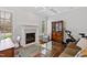 Cozy living room with fireplace, coffered ceiling, and lots of natural light at 2635 Lakeview Dr, Raleigh, NC 27609