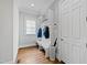 Mudroom with convenient bench and hooks for storing shoes and coats, keeping the home organized at 2635 Lakeview Dr, Raleigh, NC 27609