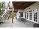 Outdoor patio offering a large seating area with multiple access points into the home at 2635 Lakeview Dr, Raleigh, NC 27609