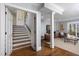 Finished basement with seating, TV, and easy access to the outdoors at 3508 Cambridge Rd, Durham, NC 27707