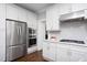 Bright, clean kitchen featuring stainless steel appliances and plenty of cabinet space at 3508 Cambridge Rd, Durham, NC 27707