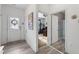 Bright, inviting foyer showcasing access to the home office and the bath at 358 E Painted Way Way, Clayton, NC 27527