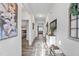 Bright hallway features stylish decor, leading to the bedroom and living room at 358 E Painted Way Way, Clayton, NC 27527