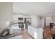 Stylish kitchen featuring white cabinets, granite countertops, stainless appliances, and a kitchen island at 37 Artesa Ct, Fuquay Varina, NC 27526