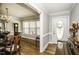 Elegant entryway with hardwood floors, crown molding, and stylish front door at 45 Wimberly Ave, Rocky Mount, NC 27804