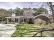 Charming home with a well-maintained lawn, brick exterior, and inviting porch at 45 Wimberly Ave, Rocky Mount, NC 27804