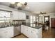 Modern kitchen with stainless steel appliances, breakfast bar, and ample counter space at 45 Wimberly Ave, Rocky Mount, NC 27804