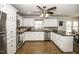 Spacious kitchen with stainless steel appliances, white cabinets, and granite countertops at 45 Wimberly Ave, Rocky Mount, NC 27804