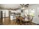 Eat in Kitchen with granite counters, wooden floors, stainless appliances and light colored cabinets at 45 Wimberly Ave, Rocky Mount, NC 27804