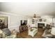 Inviting living room with hardwood floors, fireplace, and built-in shelving at 45 Wimberly Ave, Rocky Mount, NC 27804
