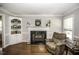 Comfortable living room showcasing fireplace, and built-in display cabinet at 45 Wimberly Ave, Rocky Mount, NC 27804