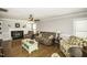 Cozy living room with a fireplace, hardwood floors, and comfortable seating area at 45 Wimberly Ave, Rocky Mount, NC 27804