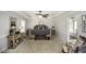 Spacious primary bedroom with hardwood floors, a ceiling fan, and an ensuite bathroom at 45 Wimberly Ave, Rocky Mount, NC 27804