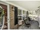Inviting porch featuring rocking chairs, a lantern, and attractive brickwork at 45 Wimberly Ave, Rocky Mount, NC 27804